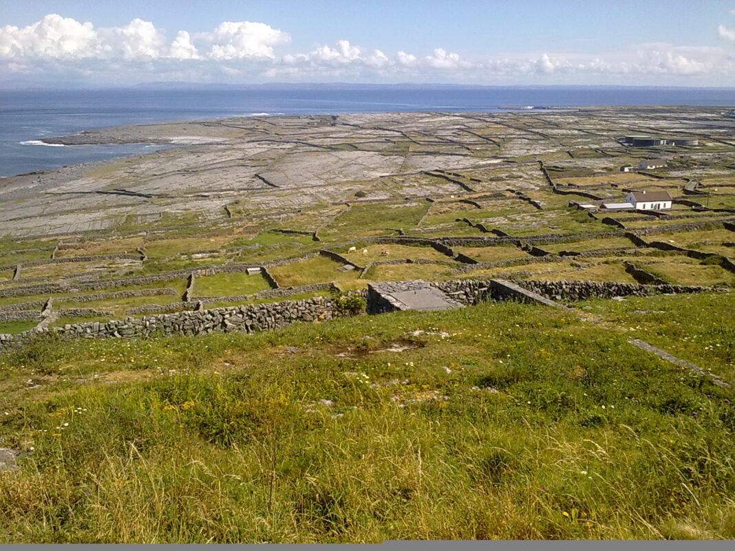Panoramic view across Inis Meáin with limestone fields and stone walls