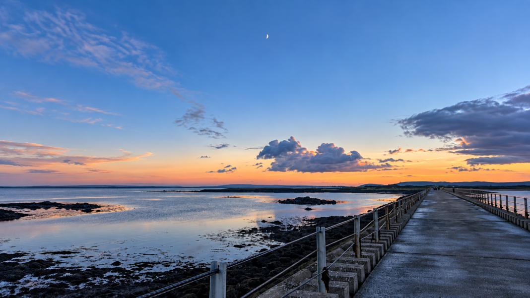 Walking the Mutton Island Causeway in Galway Mutton Island Causeway at sunset in Galway