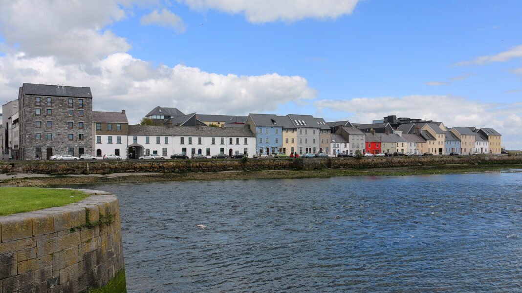 The Long Walk in Galway: From Working Quay to Iconic Waterfront Colourful houses of the Long Walk beside the River Corrib in Galway