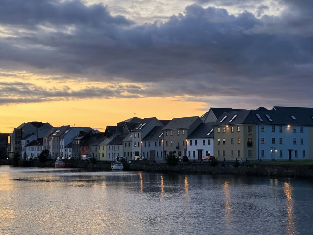 A Romantic Day in Galway: Itinerary for Couples Colourful Galway waterfront houses at sunset