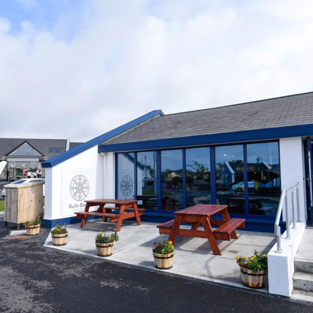 Builín Blasta Spiddal: A Café and Bakery Worth Slowing Down For Blue and white Builín Blasta café with outdoor picnic tables in Spiddal