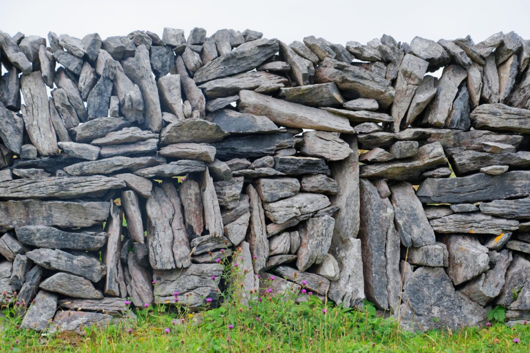 How to Get to Inis Meáin from Galway: Ferry, Shuttle & Flight Options Stone wall detail on Inis Meáin