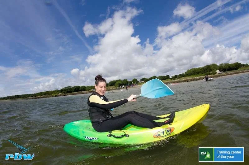 A paddler in a sit-on-top kayak at Rusheen Bay in Galway