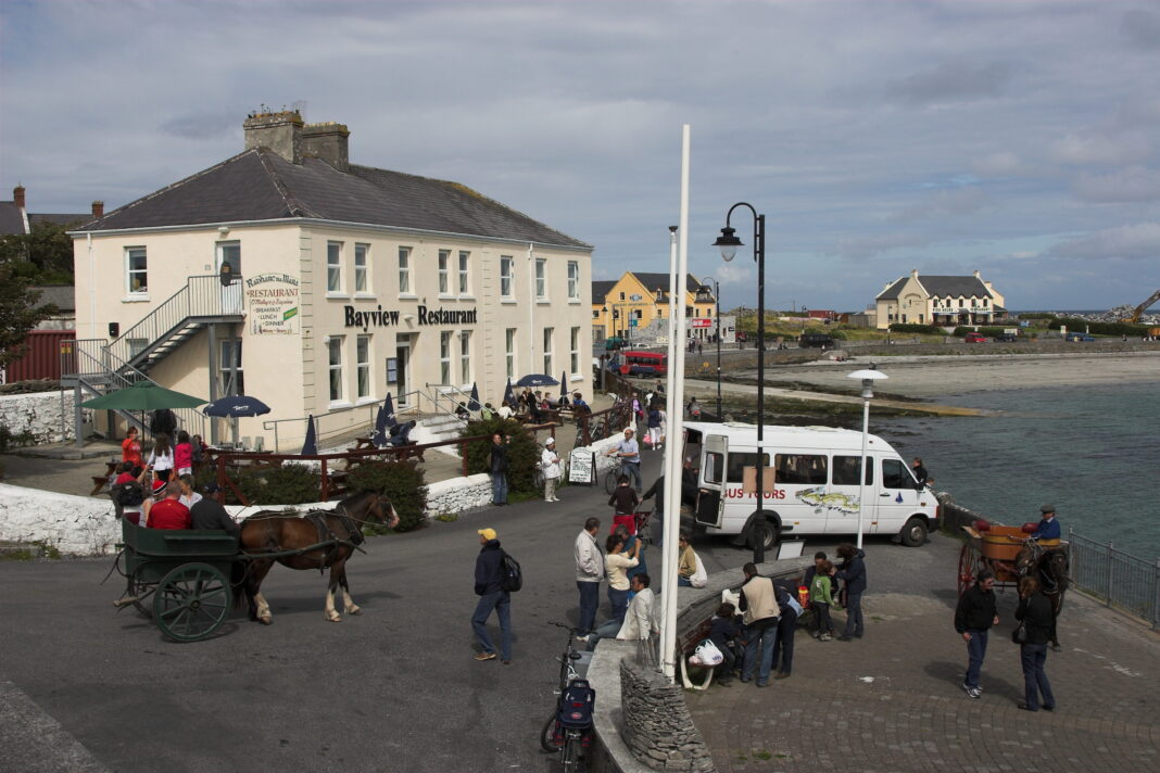 How to Get to Inis Mór from Galway: Ferry, Shuttle & Flight Options Kilronan Harbour on Inis Mór in the Aran Islands